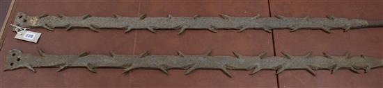 A pair of antique French wrought iron window bars